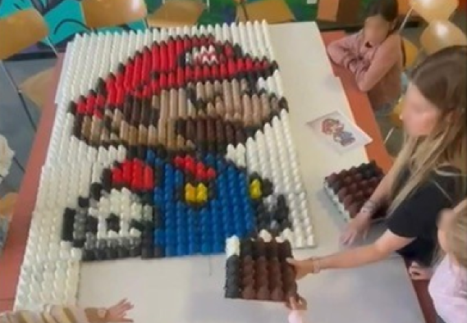 Mario géant en pixel art : un projet coloré à Perly-Certoux